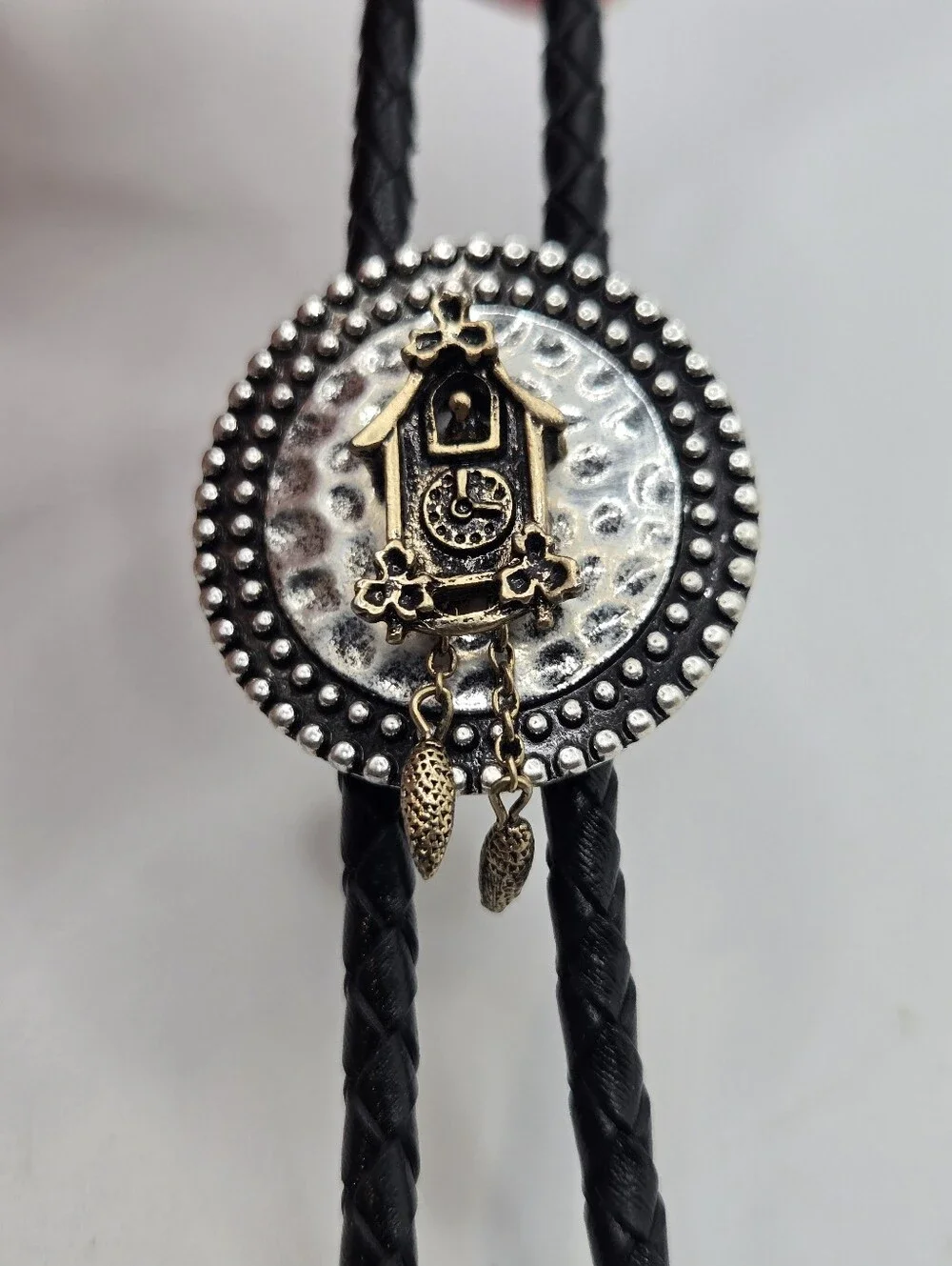 Silver Western Bolo Tie Avon Cuckoo Clock Medallion Leather Braid 70s Eclectic